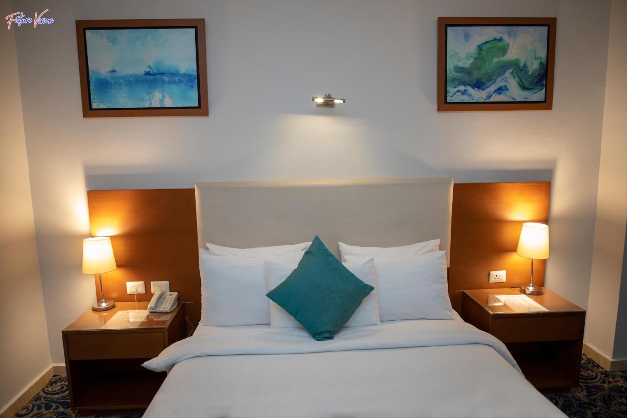 Rehana Plaza Hotel Kahire Dış mekan fotoğraf A bedroom at the hotel