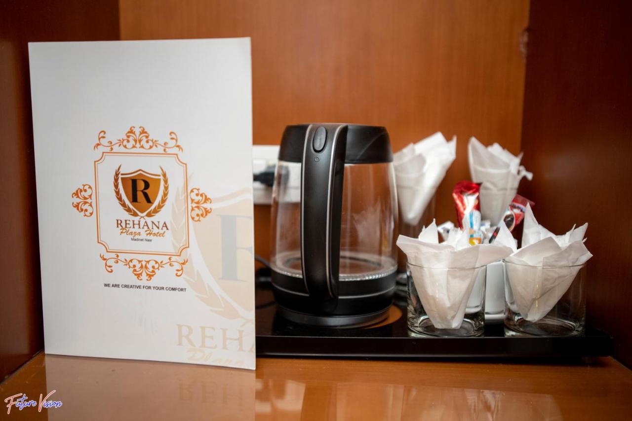 Rehana Plaza Hotel Kahire Dış mekan fotoğraf A tea and coffee making facility in a hotel room