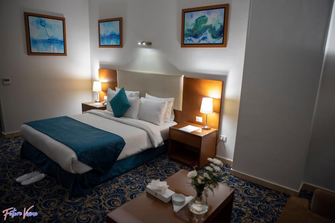 Rehana Plaza Hotel Kahire Dış mekan fotoğraf A room at the hotel
